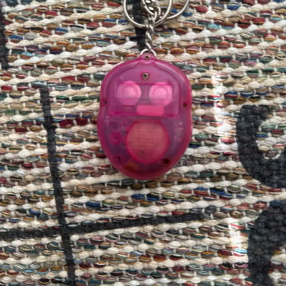 Vintage 1997 Tiger Electronics Giga Faces Virtual Facemaker Keychain Blue
